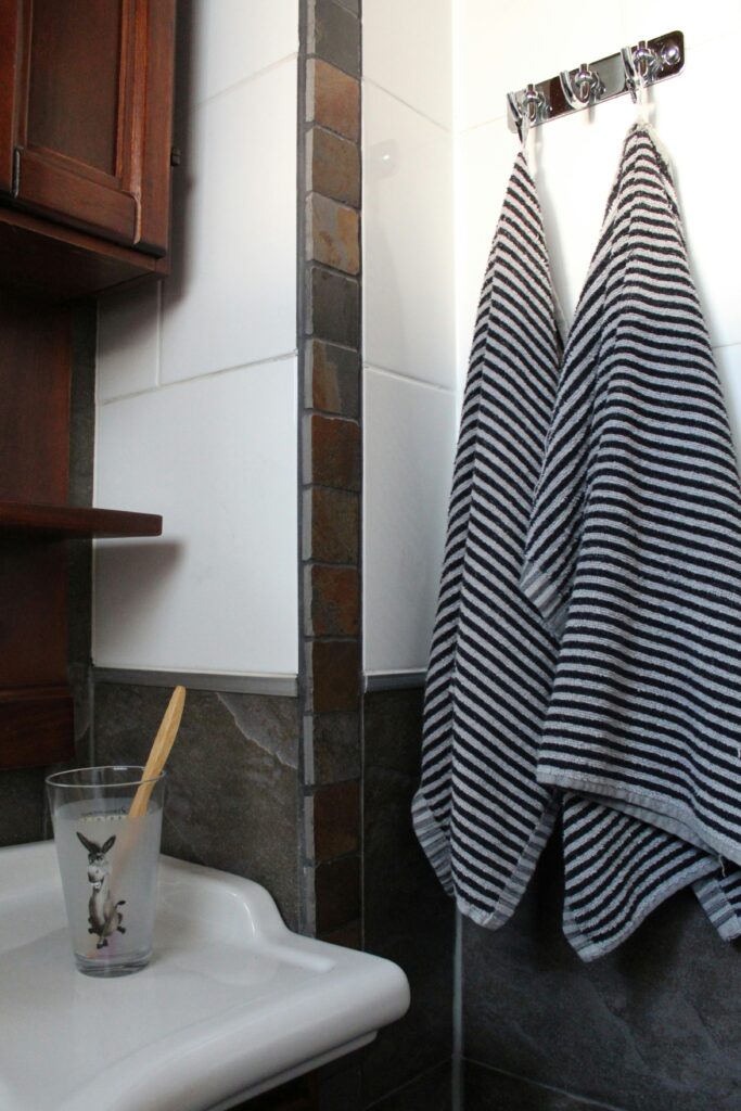 Cartoon donkey toothbrush holder hanging on the wall, perfect for small bathroom storage